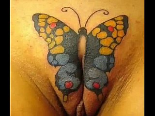 Bucetas tatuadas de vagina cackling piercing