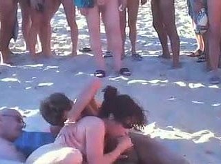 voyeur swinger beach making love